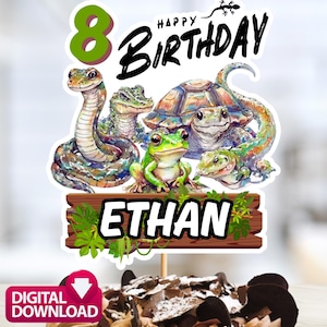 Könnte beinhalten: Ein Tortenaufsatz mit der Aufschrift "Happy Birthday" und dem Namen "Ethan". Das Design zeigt Illustrationen einer Schlange, eines Alligators, einer Schildkröte, eines Frosches und einer Eidechse sowie eine grüne Zahl 8.