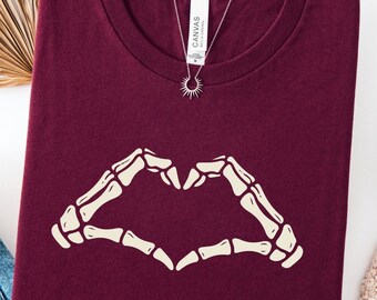 Skeleton Hand Heart Graphic Tee: Trendy Spooky Season Halloween Shirt, Retro Skull Love Gift for Women, Aesthetic Minimalist Gothic Clothing