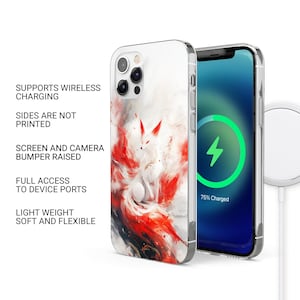 Puede incluir: Funda de tel&eacute;fono blanca con un dise&ntilde;o de zorro rojo y blanco. La funda se muestra junto a un tel&eacute;fono que muestra una interfaz de carga. La funda admite carga inal&aacute;mbrica y tiene un parachoques elevado para la pantalla y la c&aacute;mara.