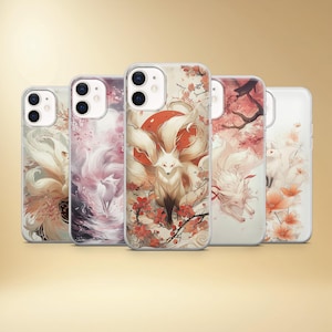May include: A collection of five phone cases featuring illustrations of white foxes with multiple tails, set against backgrounds of cherry blossoms and a red sun. The cases have a clear, glossy finish.