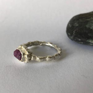 Silver ring set with raw ruby