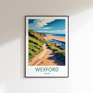 May include: A framed art print featuring a coastal landscape with a sandy path leading to a beach. The artwork depicts green hills, blue water, and a bright sky. The text "WEXFORD IRELAND" is at the bottom.