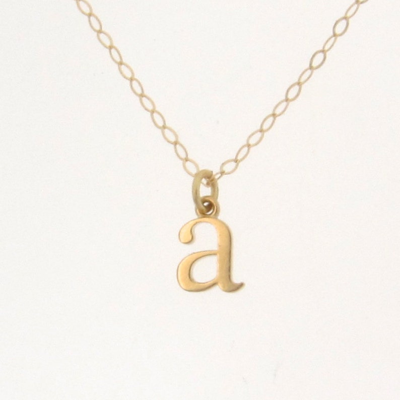 Tiny letters. Tiny letters. Tiny letters. Tiny letters. Necklace letters.