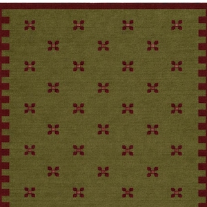 May include: Olive green rectangular rug with a repeating pattern of small, dark red floral motifs. The rug has a dark red border with a geometric design. The rug is likely made of woven material and is suitable for indoor use.