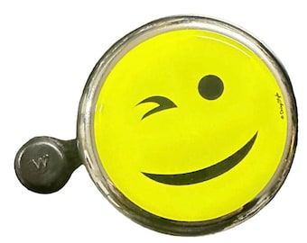 Timbre de bicicleta con carita sonriente de color amarillo neón