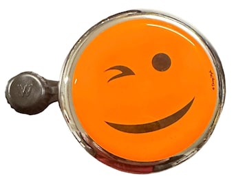 Timbre de bicicleta con carita sonriente naranja fluorescente