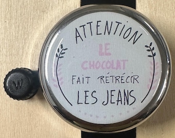 Timbre de bicicleta DringStyle. Advertencia: El chocolate encoge los vaqueros.