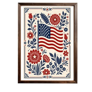 May include: A framed art print depicting the American flag, with red and white stripes and a field of blue stars. The flag is surrounded by red and blue floral and leaf patterns on a cream backdrop. The frame is dark brown.