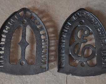 2 salvamanteles antiguos de hierro fundido con diseño de Filadelfia, adornados y decorativos, en negro