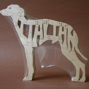 May include: Wooden puzzle of a dog, with the word "ITALIAN" spelled out in the dog's body.