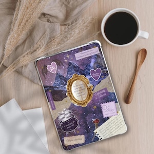 May include: A clear tablet case with a collage design featuring a purple night sky, mountains, and various stickers. The stickers include hearts, a cauldron, and text such as "Bat Boys" and "Shadow Daddies". A cup of coffee and a wooden spoon are also visible.