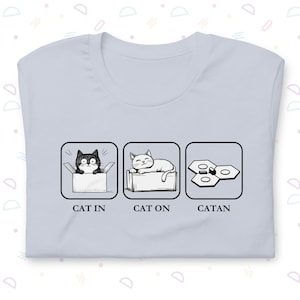 Lustiges Catan Brettspiel-T-Shirt, Katzen in den Boxen Siedler von Catan-T-Shirt für Tischspieler, Katzen- und Brettspiele-Comedy-Shirt, Geschenk-Upgrade