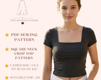May include: A dark gray square neck crop top. The image also includes text that reads: "The Tiny Hearts Pattern", "PDF Sewing Pattern", "Square Neck Crop Top Pattern", "Ladies Size; US 2 to 30 XS to 4XL", and "Suitable for; A0-A4 US Letter".