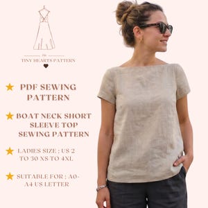 Puede incluir: Una mujer con una blusa beige de cuello barco y manga corta. La imagen incluye el texto "The Tiny Hearts Pattern", "PDF Sewing Pattern", "Boat Neck Short Sleeve Top Sewing Pattern", "Ladies Size: US 2 to 30 XS to 4XL" y "Suitable for; A0-A4 US Letter".