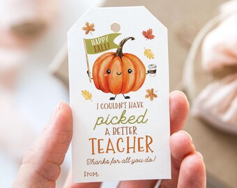 May include: A white gift tag with a cartoon pumpkin holding a flag that says "Happy Fall!" and a coffee cup. The tag reads "I couldn't have picked a better teacher. Thanks for all you do!" with space for a name.