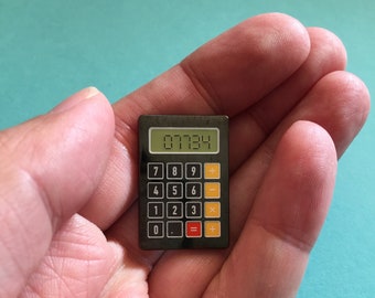 Hello Calculator - glow in the dark, hard enamel pin