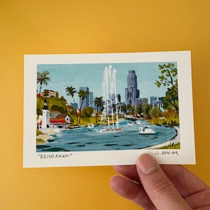 May include: A painting of Echo Park in Los Angeles, California. The painting depicts a lake with a fountain in the center, surrounded by trees and buildings. The text "ECHO PARK" is written at the bottom of the painting.