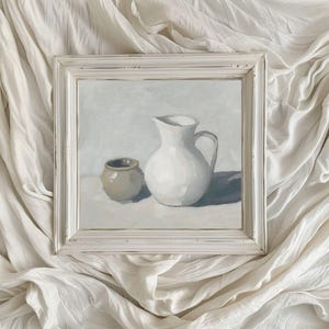 May include: A white framed painting of a white pitcher and a small brown pot on a white background.