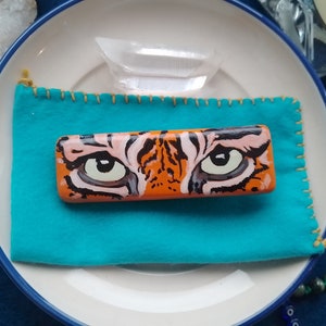 Hand painted wooden hairgrip with Tiger eyes design