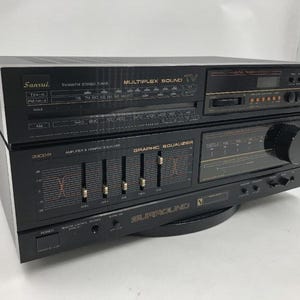 Amplificador Sansui de 33 CD-R + ecualizador gráfico y sintonizador de TV MP Sound. Funciona correctamente.