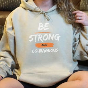 Christian Sweatshirt Faith Based Apparel Gift Idea Hoodie Strong and Courageous Design Faith Inspired Hoodie Joshua 1:9 Scripture Sweatshirt