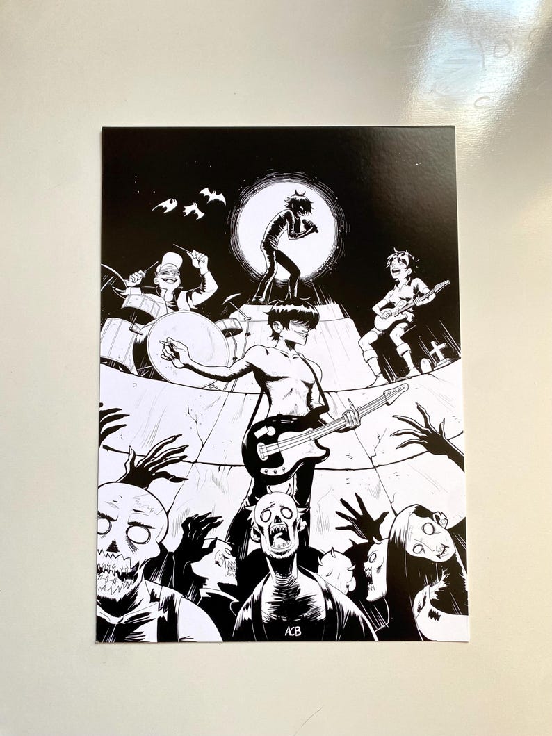 May include: Black and white illustration of a band performing on stage, surrounded by zombies. The band members are playing drums, guitar, and bass. The artwork has a comic book style with a dark, gothic theme.