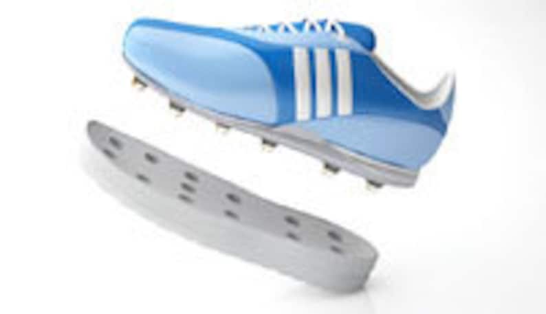 May include: Light blue and white athletic shoe with three white stripes on the side. The shoe has a white sole with small cleats and a separate white insole. The shoe is designed for sports and athletic activities.