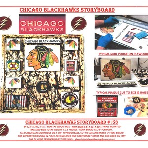 May include: Chicago Blackhawks Storyboard #153. A wooden base with a neon sign and multiple plaques featuring the Chicago Blackhawks logo. The plaques are cut to size and raised from the base. The base is 24.5 inches by 24.5 inches by 1 inch and the sign is 15.5 inches by 12 inches by 0.25 inches.