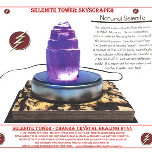 May include: A purple selenite tower crystal on a wooden base with a rotating light base. The tower is 4 inches high and 1.5 inches in diameter. The base is 6 inches by 6 inches and 3/4 inch thick. The text "Selenite Tower - Chakra Crystal Healing #144" is printed on the base.