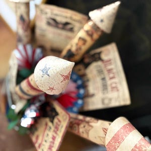 Printable patriotic rockets styled in finished display arrangement for Fourth of July home decor