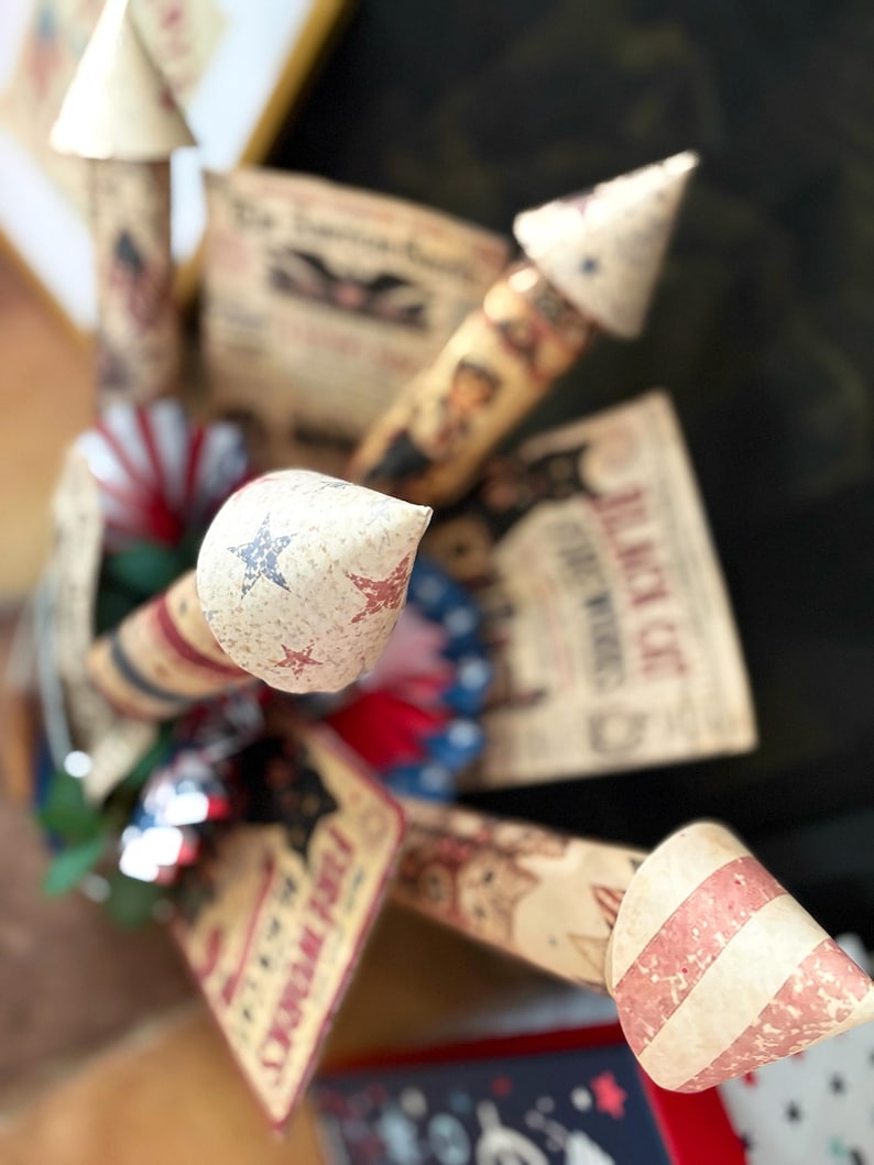 Printable patriotic rockets styled in finished display arrangement for Fourth of July home decor