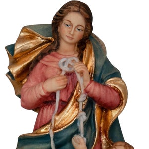 Madonna dei Nodi statue, wooden sculpture from Val Gardena. The statue is carved in maple wood and hand painted