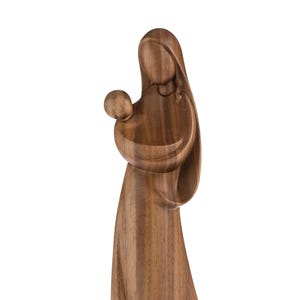 madonna with jesus modern style, wooden sculpture from Val Gardena. The statue is carved in walnut wood