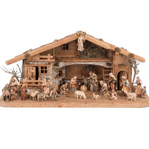 25-piece wooden nativity scene figurine set with hut