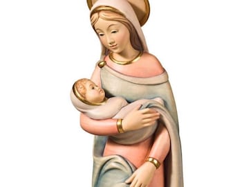 Estatua de la Virgen de la Logia, una escultura de madera procedente de Val Gardena. La estatua está tallada en madera de arce y pintada a mano.