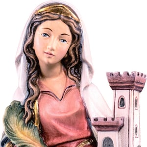 statue of Saint Barbara, wooden sculpture from Val Gardena. The statue is carved in maple wood and hand painted