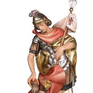 statue of saint florian, wooden sculpture from Val Gardena. The statue is carved in maple wood and hand painted