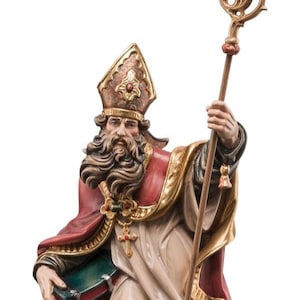 statue of saint bertrand, wooden sculpture from Val Gardena. The statue is carved in maple wood and hand painted