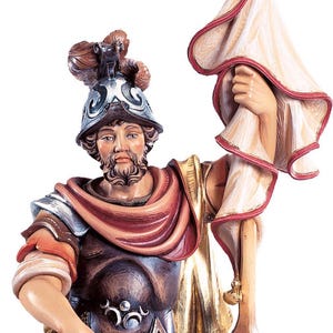 statue of saint florian, wooden sculpture from Val Gardena. The statue is carved in maple wood and hand painted