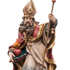 statue of saint augustine, wooden sculpture from Val Gardena. The statue is carved in maple wood and hand painted