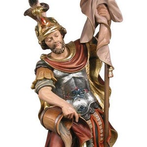 statue of saint florian, wooden sculpture from Val Gardena. The statue is carved in maple wood and hand painted