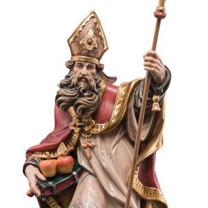 statue of saint nicolo, wooden sculpture from Val Gardena. The statue is carved in maple wood and painted by hand
