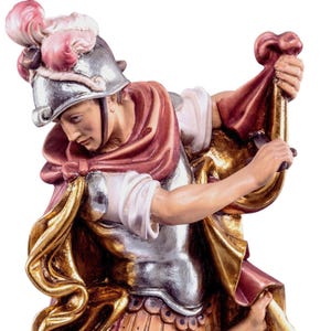 statue of fra san martino, wooden sculpture from Val Gardena. The statue is carved in maple wood and hand painted