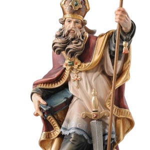 statue of saint boniface, wooden sculpture from Val Gardena. The statue is carved in maple wood and hand painted