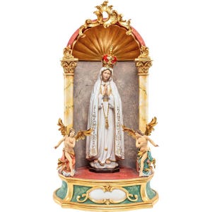 Madonna of Fatima statue with altar, wooden sculpture from Val Gardena. The statue is carved in maple wood and hand painted