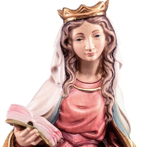 statue of Saint Christina, wooden sculpture from Val Gardena. The statue is carved in maple wood and hand painted