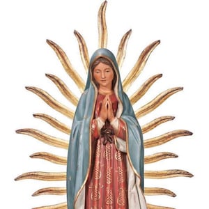 Madonna Guadalupe statue, wooden sculpture from Val Gardena. The statue is carved in maple wood and hand painted