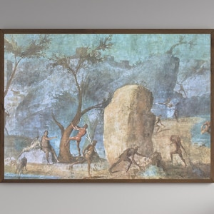 May include: A framed painting depicting a classical scene with figures, trees, and a large rock formation. The artwork features muted blues, greens, and browns, with a dark brown frame. The figures are engaged in various activities, creating a sense of movement.