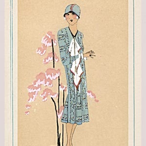 1920s Art Deco fashion illustration from Tres Parisien magazine showing a stylish woman in powder blue dress with white tie collar and matching cloche hat, standing beside pink cherry blossoms. Digital wall art from French vintage fashion publication.