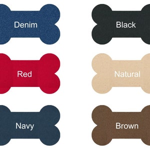 K&ouml;nnte beinhalten: Sechs kauknochenf&ouml;rmige Kauspielzeuge in verschiedenen Farben: Jeansblau, Schwarz, Rot, Naturbeige, Marineblau und Braun.